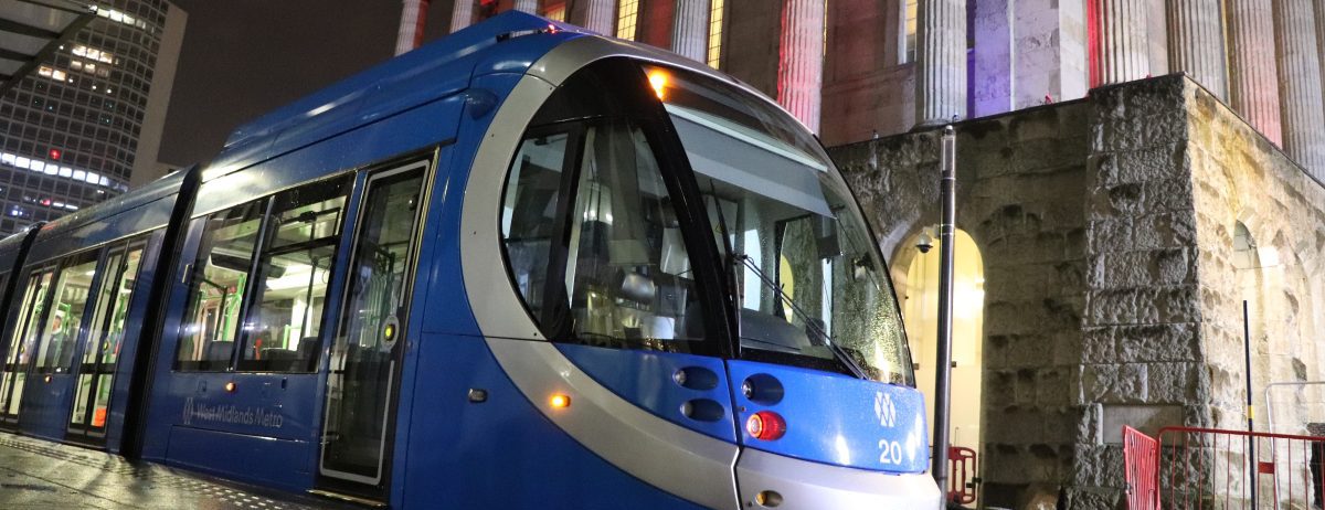 Close up of front of tram at night