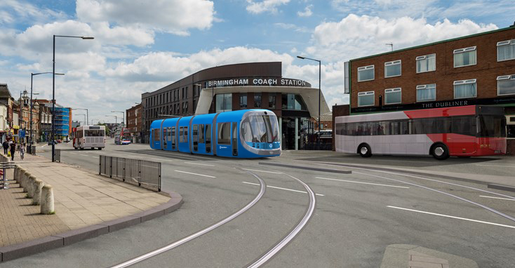 West Midlands Metro tram on tracks outside of Birmingham Coach Station