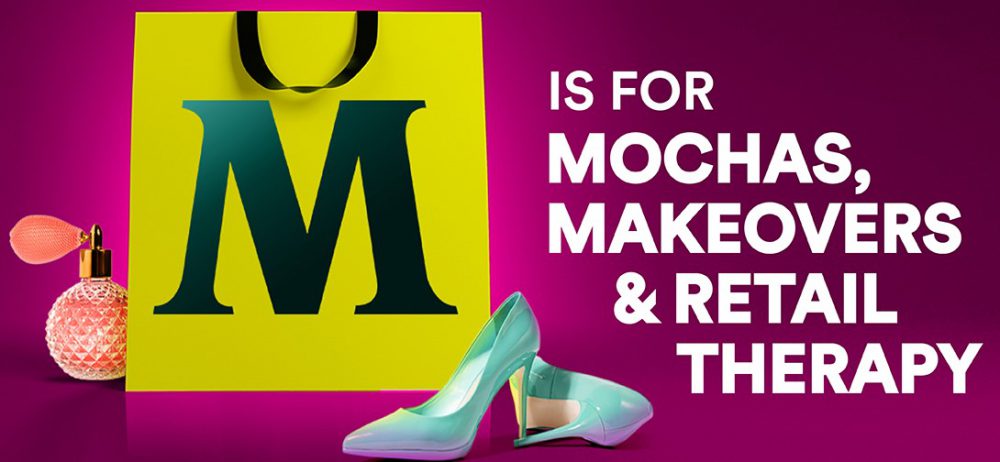 M is for mochas, makeovers and retail therapy - Shopping bag with M on with perfume bottle and high heeled shoes