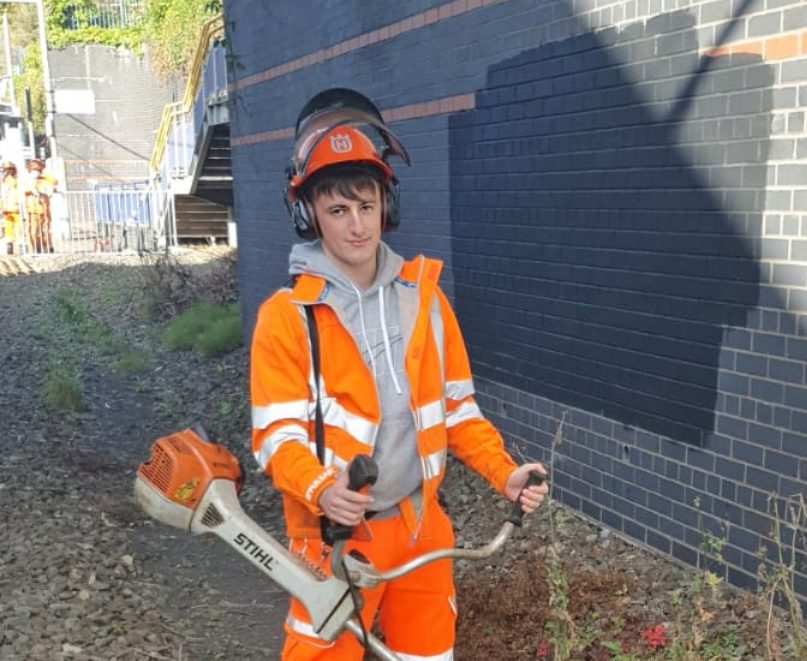 Apprentice in high vis working for WMM