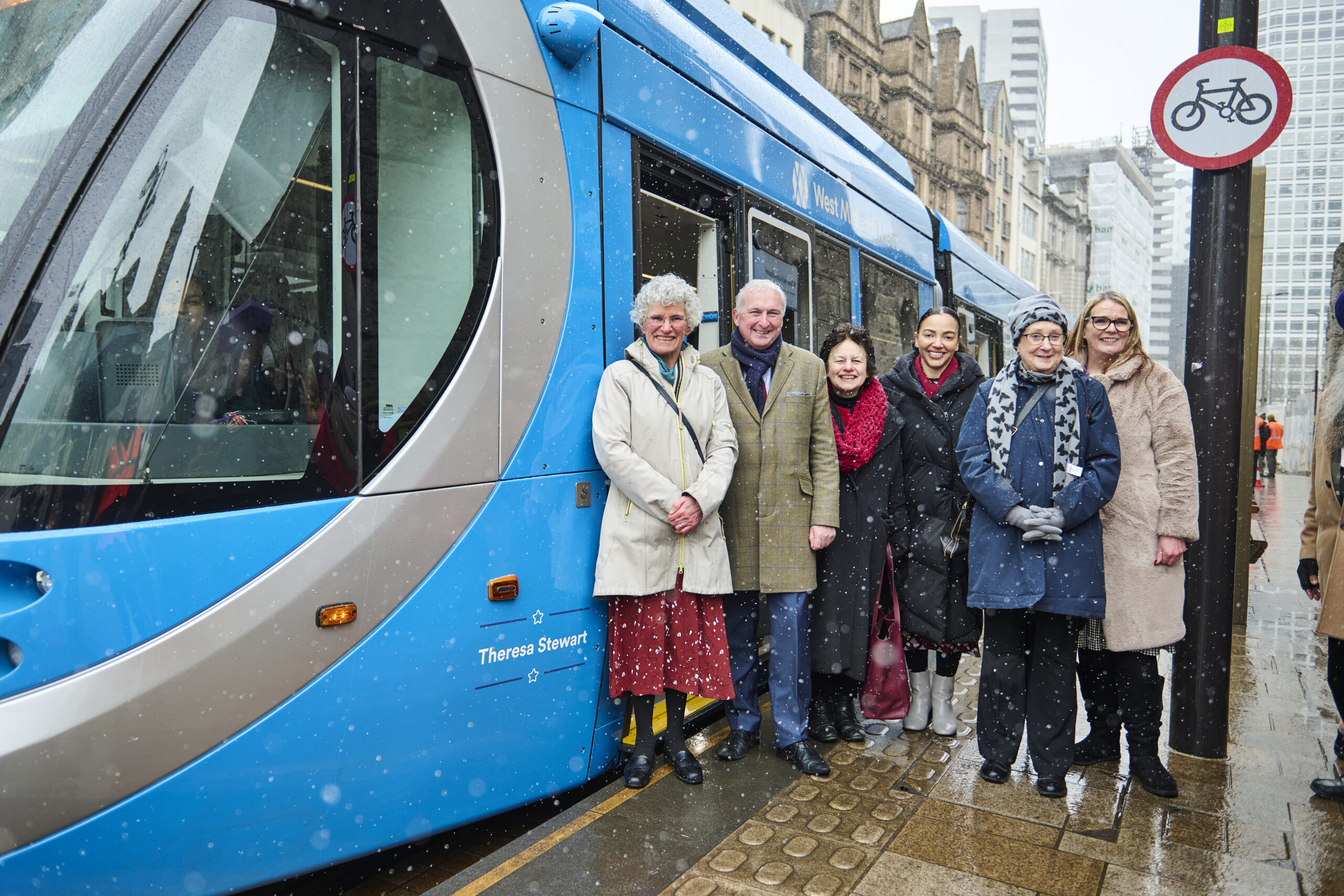 a picture of Birmingham city council's first female leader with the tram named after her.