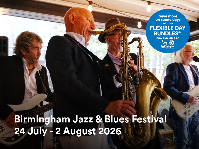 Band of jazz and blues players performing to an audience.